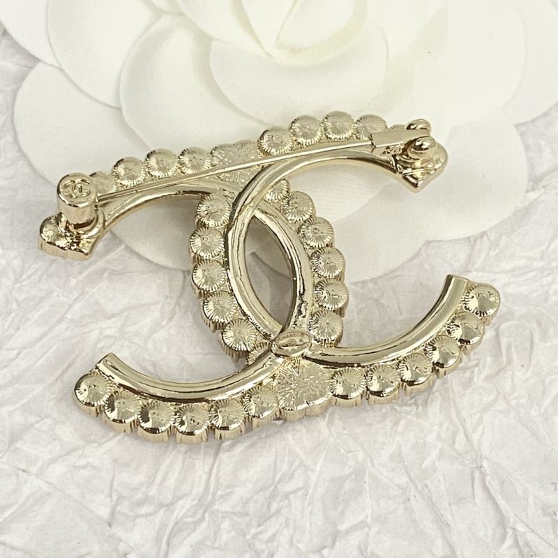 Ch**el brooches